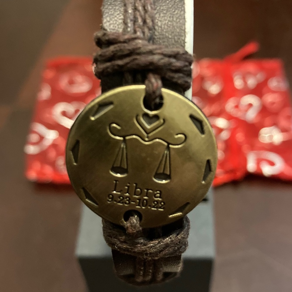 Libra Medallion wrist band with leather strap